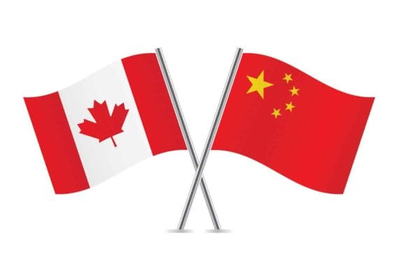 Canadian and Chinese flags. Vector illustration.